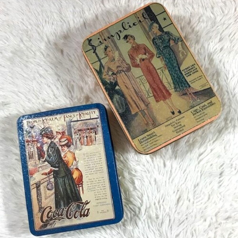 Set of 2 Vintage Coca-Cola 'Realm of Fancy to Reality' + Simplicity Fashion Tins